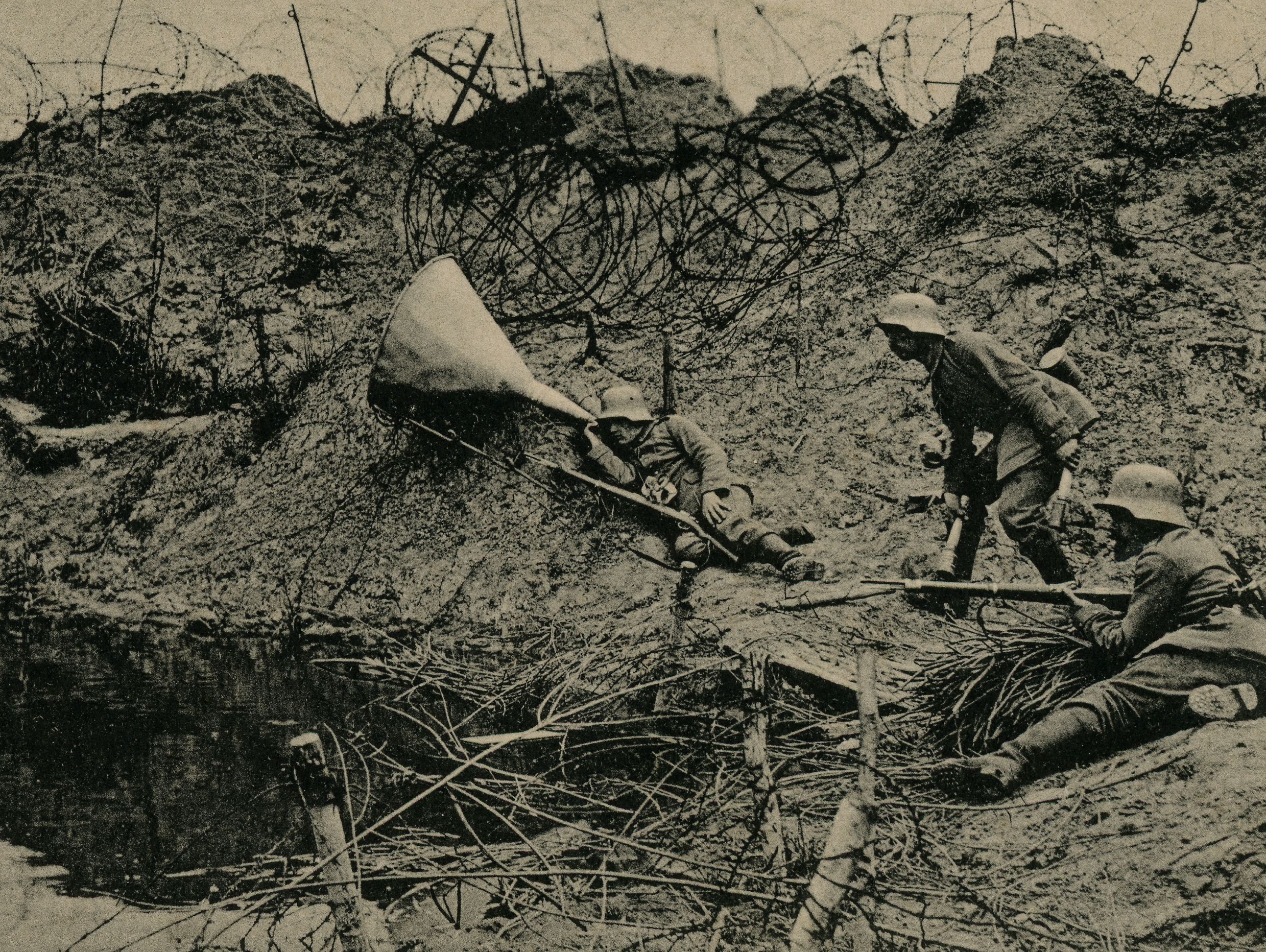 "Real images of the World War. Listening post in a mine crater," 1917
