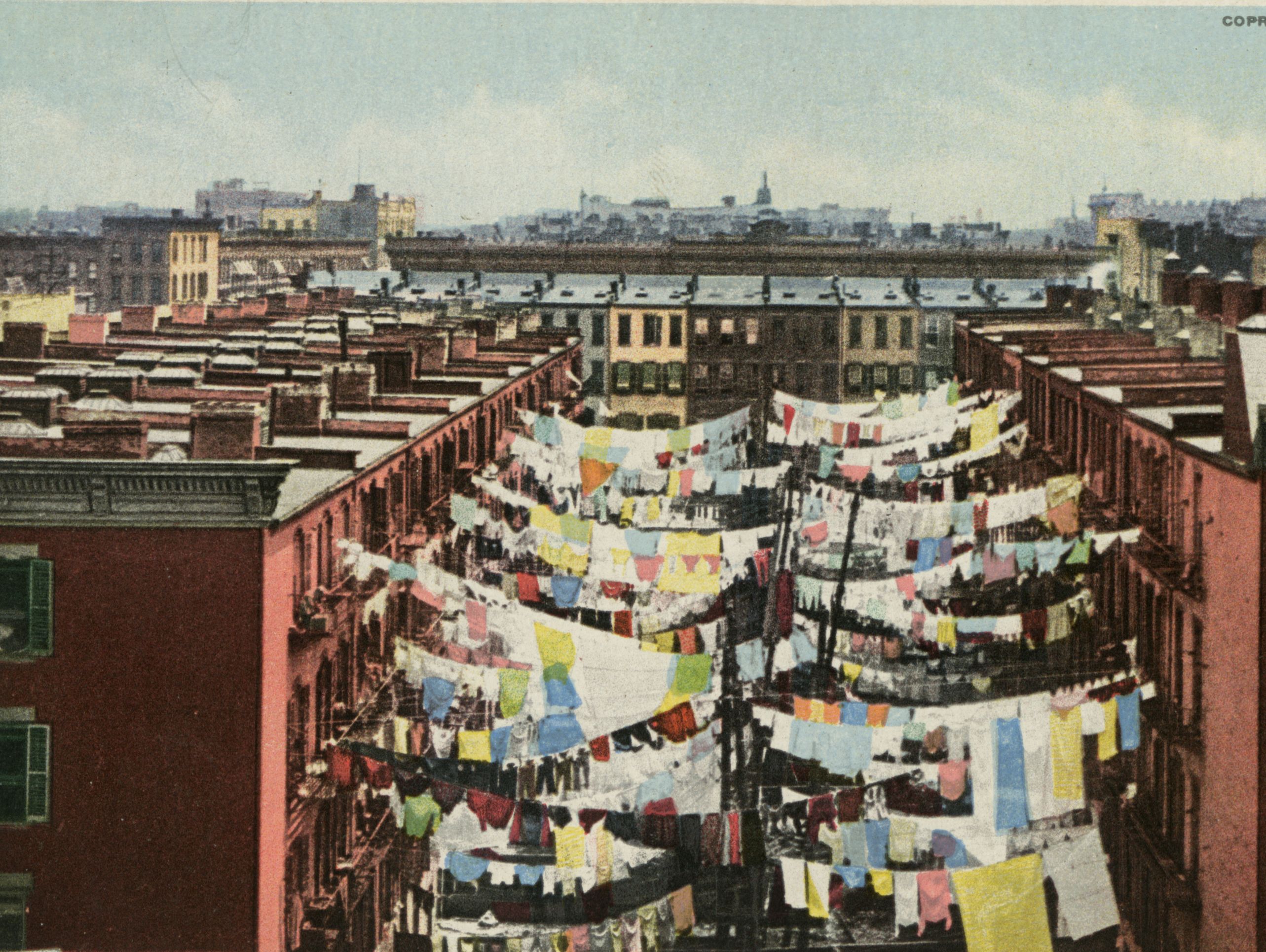 "Yard of a tenement, New York," early 1900s